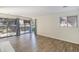 Bright and airy living room with large windows and sliding glass doors offering outdoor views at 500 Manhattan Dr # B1, Boulder, CO 80303