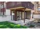 This home features a private patio with sliding glass doors and a cozy fireplace view at 500 Manhattan Dr # B1, Boulder, CO 80303