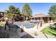 Community pool enclosed by a fence, providing a refreshing amenity for residents at 500 Manhattan Dr # B1, Boulder, CO 80303