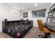 Well-lit bedroom featuring playful sports decor, study desk, and a large window at 3044 W 37Th Ave, Denver, CO 80211