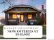 Inviting home with a covered porch and front yard now offered at a new price at 3044 W 37Th Ave, Denver, CO 80211