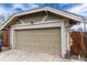 Single car garage with traditional carriage doors and brick siding at 3044 W 37Th Ave, Denver, CO 80211