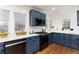 This gorgeous kitchen has stainless steel appliances and a clean white countertop at 3044 W 37Th Ave, Denver, CO 80211
