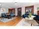 Stylish living and dining area with hardwood floors, modern decor, and an inviting atmosphere at 3044 W 37Th Ave, Denver, CO 80211