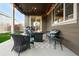 Cozy backyard patio featuring string lights, outdoor furniture, a fire pit, and a barbecue grill at 12563 Grape St, Thornton, CO 80241