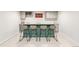 Finished basement bar with seating for four, stylish lighting, and storage space at 12563 Grape St, Thornton, CO 80241