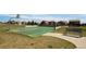 Well-maintained community basketball court with a bench, perfect for a friendly game and outdoor enjoyment at 12563 Grape St, Thornton, CO 80241
