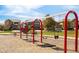 Fun community playground with swings and a spring rider for children to enjoy outdoors at 12563 Grape St, Thornton, CO 80241