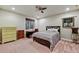 Bedroom features a bed, desk, dresser, and window with blinds at 3534 Starry Night Loop, Castle Rock, CO 80109