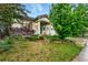 Charming home featuring a well-manicured lawn, vibrant greenery, decorative plants, and a welcoming front porch at 3534 Starry Night Loop, Castle Rock, CO 80109