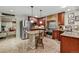 Well-appointed kitchen with granite countertops, stainless steel appliances, island, and tile flooring at 3534 Starry Night Loop, Castle Rock, CO 80109