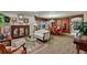An elegant living room boasts classic decor, a dining area, plush seating, and ample natural light at 3534 Starry Night Loop, Castle Rock, CO 80109