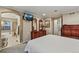 Spacious main bedroom featuring dresser, mirror and access to bathroom at 3534 Starry Night Loop, Castle Rock, CO 80109