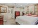 Spacious main bedroom featuring dresser, mirror and access to bathroom at 3534 Starry Night Loop, Castle Rock, CO 80109