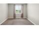 Empty bedroom with neutral walls and carpet, offering a blank canvas for personalization at 10067 Bluffmont Ct, Lone Tree, CO 80124