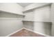 Walk-in closet with carpet and shelving at 10067 Bluffmont Ct, Lone Tree, CO 80124