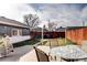 Spacious backyard featuring a patio, lawn and fence, great for outdoor activities and privacy at 4070 W Exposition Ave, Denver, CO 80219