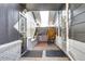 The brick-paved passageway features gated entryways, providing both charm and security at 4070 W Exposition Ave, Denver, CO 80219