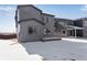 Home with back patio and yard with modern design at 13531 E 99Th Pl, Commerce City, CO 80022