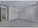 An open bedroom offers soft carpeting, recessed lighting, and a nearby landing area at 13531 E 99Th Pl, Commerce City, CO 80022