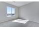 Bedroom bathed in light featuring neutral carpet, walls and a bright window view at 13531 E 99Th Pl, Commerce City, CO 80022