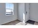 Inviting entryway with stylish front door and a glimpse of the outdoor scenery at 13531 E 99Th Pl, Commerce City, CO 80022