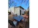 Backyard patio featuring an outdoor dining set with chairs and paver patio at 914 E Iowa Ave, Denver, CO 80210
