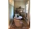 Cozy dining nook with a small table and a neutral color palette at 914 E Iowa Ave, Denver, CO 80210