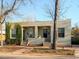 Charming duplex with individual entrances and well-maintained landscaping at 914 E Iowa Ave, Denver, CO 80210