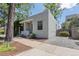 Exterior view of a charming home with a well-maintained yard and driveway at 914 E Iowa Ave, Denver, CO 80210