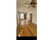 Inviting living room featuring beautiful hardwood floors, a ceiling fan, and ample natural light at 914 E Iowa Ave, Denver, CO 80210