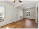 Comfortable living room showcases hardwood floors and a decorative fireplace detail at 914 E Iowa Ave, Denver, CO 80210