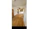 Spacious open living area with hardwood floors and bright natural lighting at 914 E Iowa Ave, Denver, CO 80210