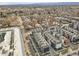 An aerial view of the modern townhome community highlighting the surrounding neighborhood at 1007 Chase St, Lakewood, CO 80214