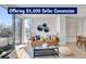 Bright living room with hardwood floors, modern furniture, and a large window at 1007 Chase St, Lakewood, CO 80214