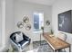 Cozy office features modern decor, hardwood floors, and ample natural light for a productive workspace at 1007 Chase St, Lakewood, CO 80214