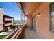 Private balcony with railing and wooden deck overlooking beautiful views, and is a serene outdoor space at 4681 S Decatur St # 227, Englewood, CO 80110