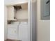 Laundry closet equipped with a side-by-side washer and dryer at 4681 S Decatur St # 227, Englewood, CO 80110