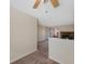 The living room has a fireplace with stone surround, neutral paint, and access to an outdoor space at 4681 S Decatur St # 227, Englewood, CO 80110