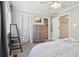 Cozy bedroom boasts a workstation, closet, and ensuite bathroom, creating a private retreat at 6142 Gorham St, Frederick, CO 80530