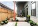 Charming back patio area perfect for enjoying outdoor living and dining, with plants all around at 6251 N Galena St, Denver, CO 80238