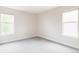 Sunlit bedroom featuring neutral carpet and paint ready for personalization at 6251 N Galena St, Denver, CO 80238
