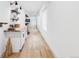 Bright hallway with built-in counter, shelving and lots of storage at 6251 N Galena St, Denver, CO 80238