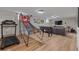 Finished basement game room with basketball arcade, treadmill and foosball table at 13402 W 24Th Pl, Golden, CO 80401