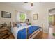 Cozy bedroom offers hardwood floors, soft lighting, and ample space at 13402 W 24Th Pl, Golden, CO 80401