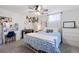 Bright bedroom with a ceiling fan, and unique decor at 13402 W 24Th Pl, Golden, CO 80401