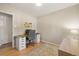 Functional home office with hardwood floors, natural light, and ample workspace at 13402 W 24Th Pl, Golden, CO 80401