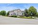 Well-maintained home exterior featuring tidy landscaping and street views at 17298 E Lake Pl, Aurora, CO 80016