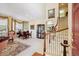 Spacious living room with elegant staircase and traditional decor at 17298 E Lake Pl, Aurora, CO 80016