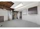 Unfinished basement with water heater and access to other areas at 1994 Macon St, Aurora, CO 80010